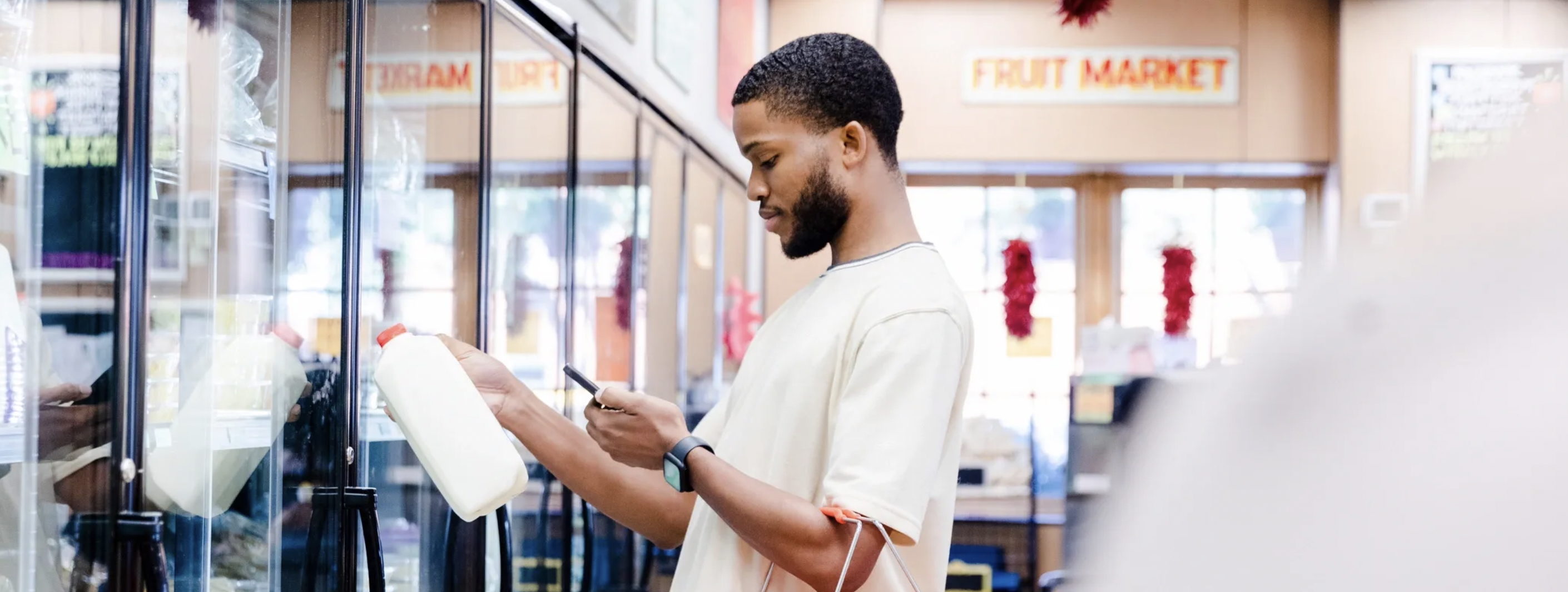 HAVN member checking savings while shopping